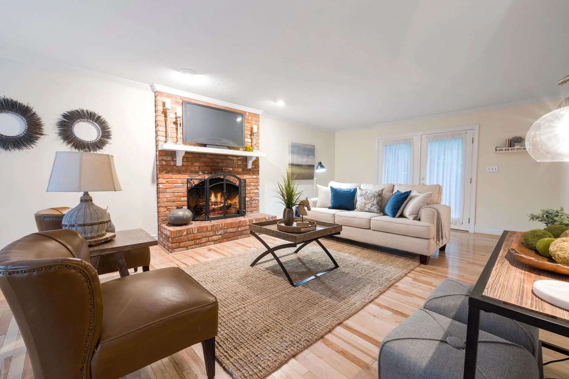 Sophisticated living room with fireplace and contemporary seating